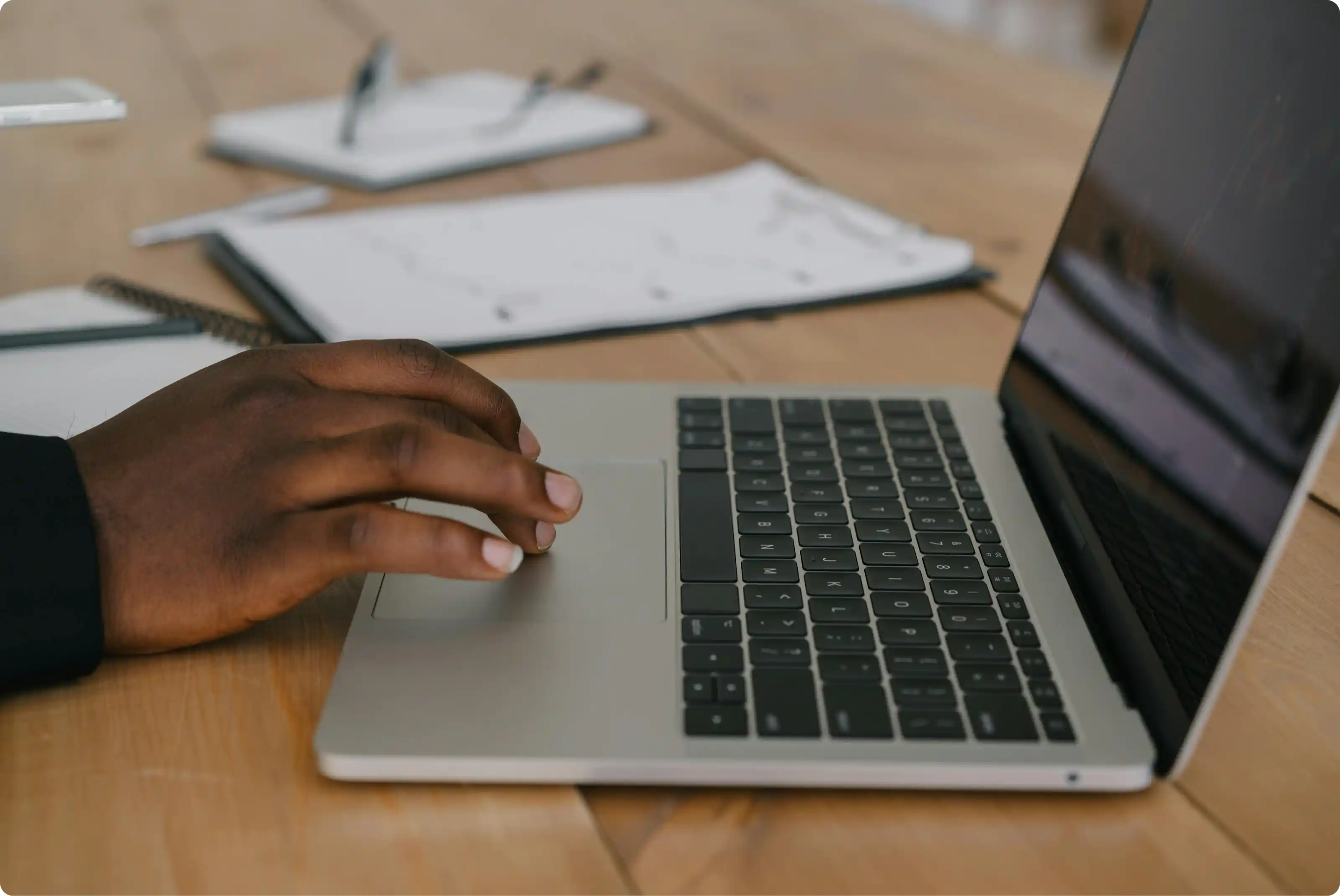 Person typing on laptop